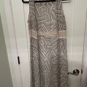 Geometric Patterned Sleeveless Long Cardigan Overlay